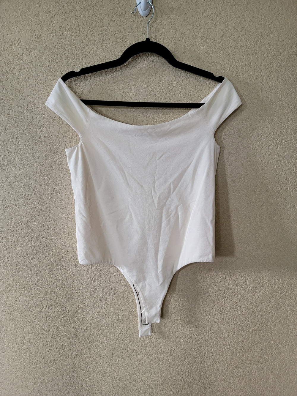 KHAITE Off-the-Shoulder Stretch Bodysuit In Cream, Size XL